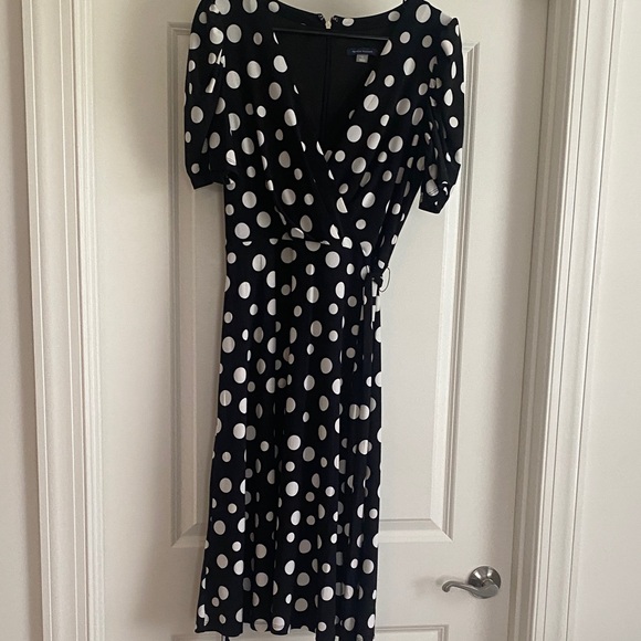 Tommy Hilfiger Dresses & Skirts - Tommy Hilfiger Black and White Polka Dot Midi Wrap Dress

PTP 17-21

Length 42”